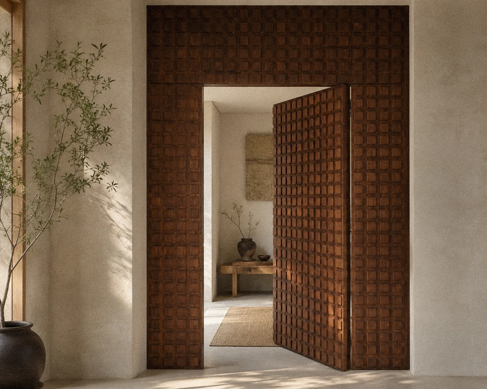 Carved double door opening to a hallway