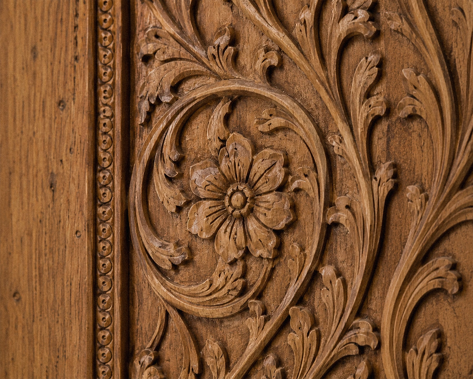 Hand-carved floral relief detail