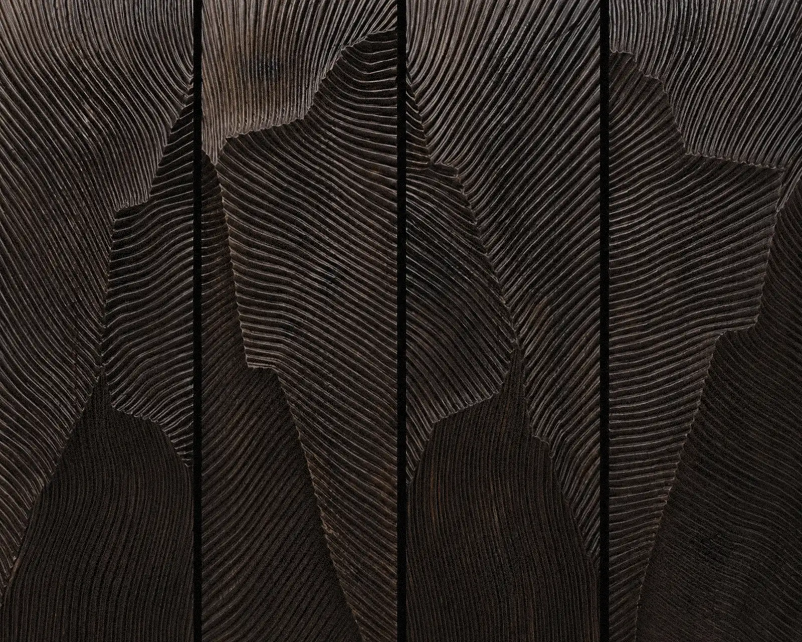 Carved abstract relief panels